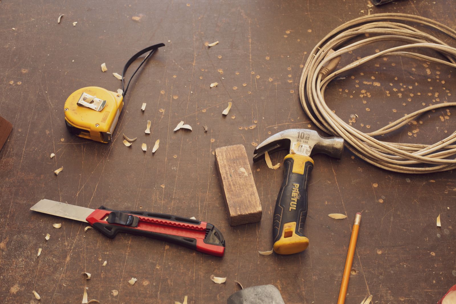 Tradesperson working carefully on a construction detail
